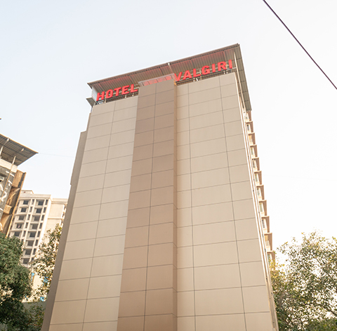 Hotel Dhavalgiri tower exterior against the sky