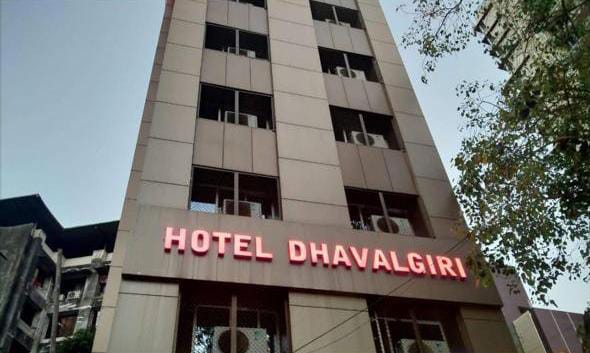 Hotel Dhavalgiri tower exterior against the sky